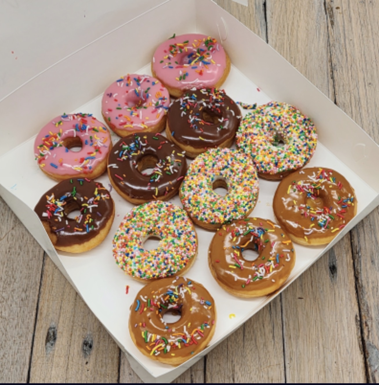 Iced mini donut box for shared morning tea